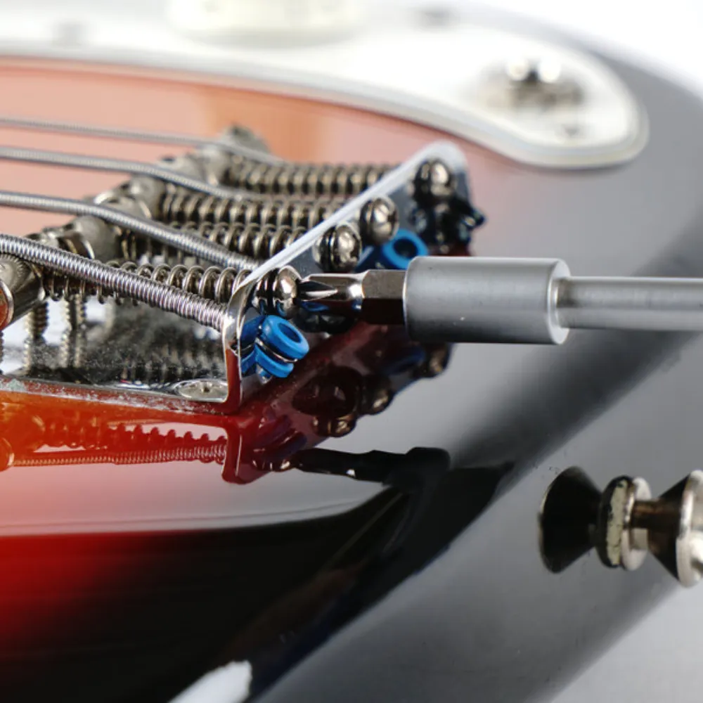 Screwdriver to adjust bass saddles