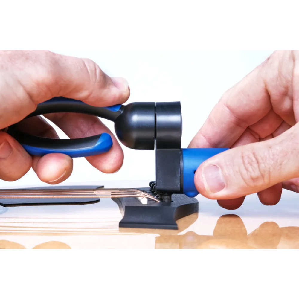 pull acoustic guitar bridge pins easily