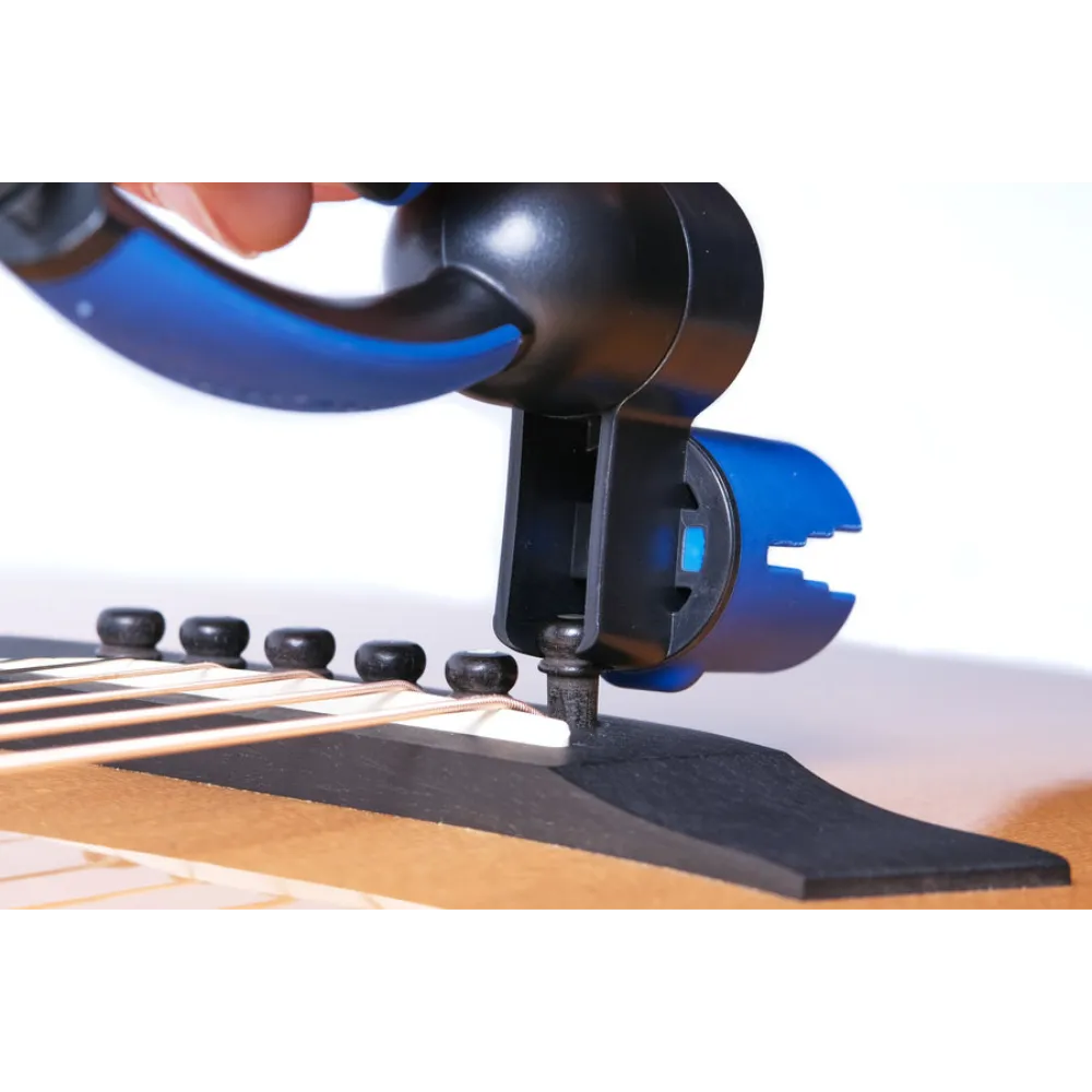 universal design allows you to pull acoustic guitar bridge pins easily