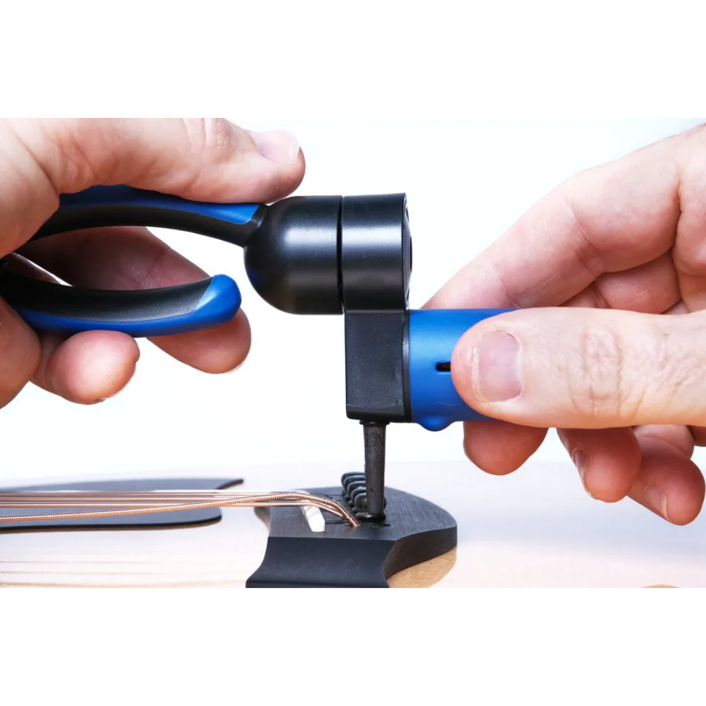 universal design allows you to pull acoustic guitar bridge pins easily