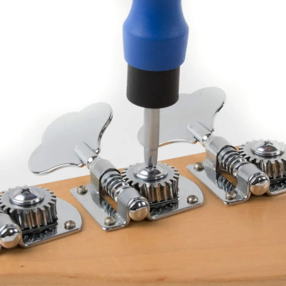 Screwdriver tightens tuner screws