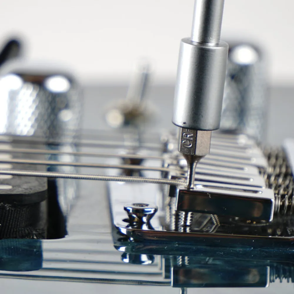 Allen Key to adjust electric guitar bridge saddles like on this Tom Anderson Guitar