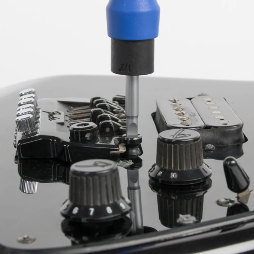Works to help adjust screws found on electric guitar bridges like this fender start